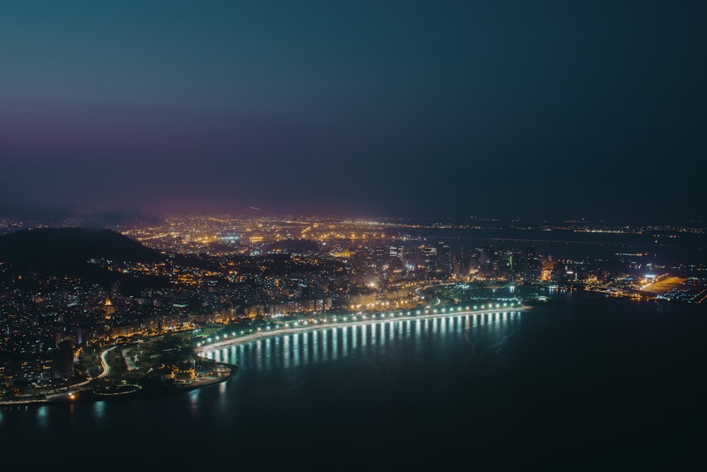 city lights turned on during night time