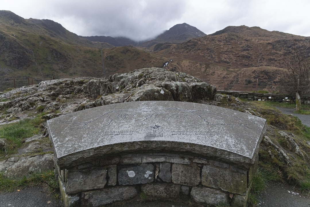 gray concrete wall on top of mountain