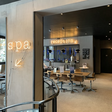 people sitting on chairs inside building