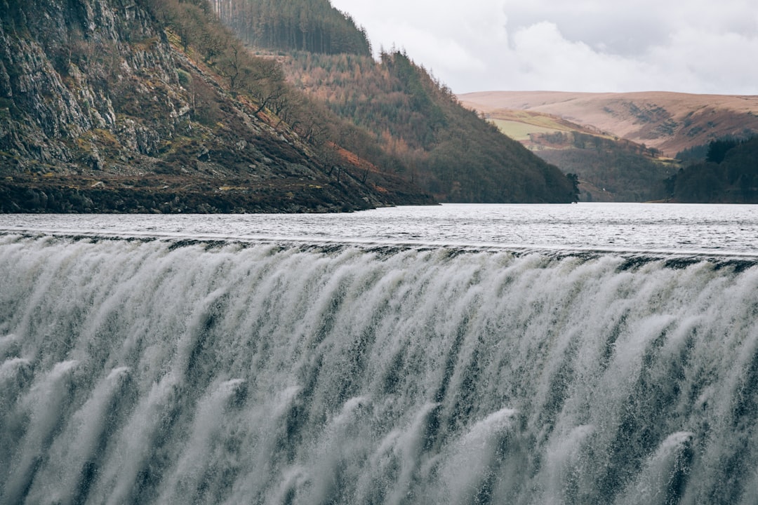 "... in time of flood, when the storm water rushes over the crest and falls to a depth of over 120 feet, the dam at Caban Coch will present the appearance of a magnificent waterfall" - Eustace Tickell 