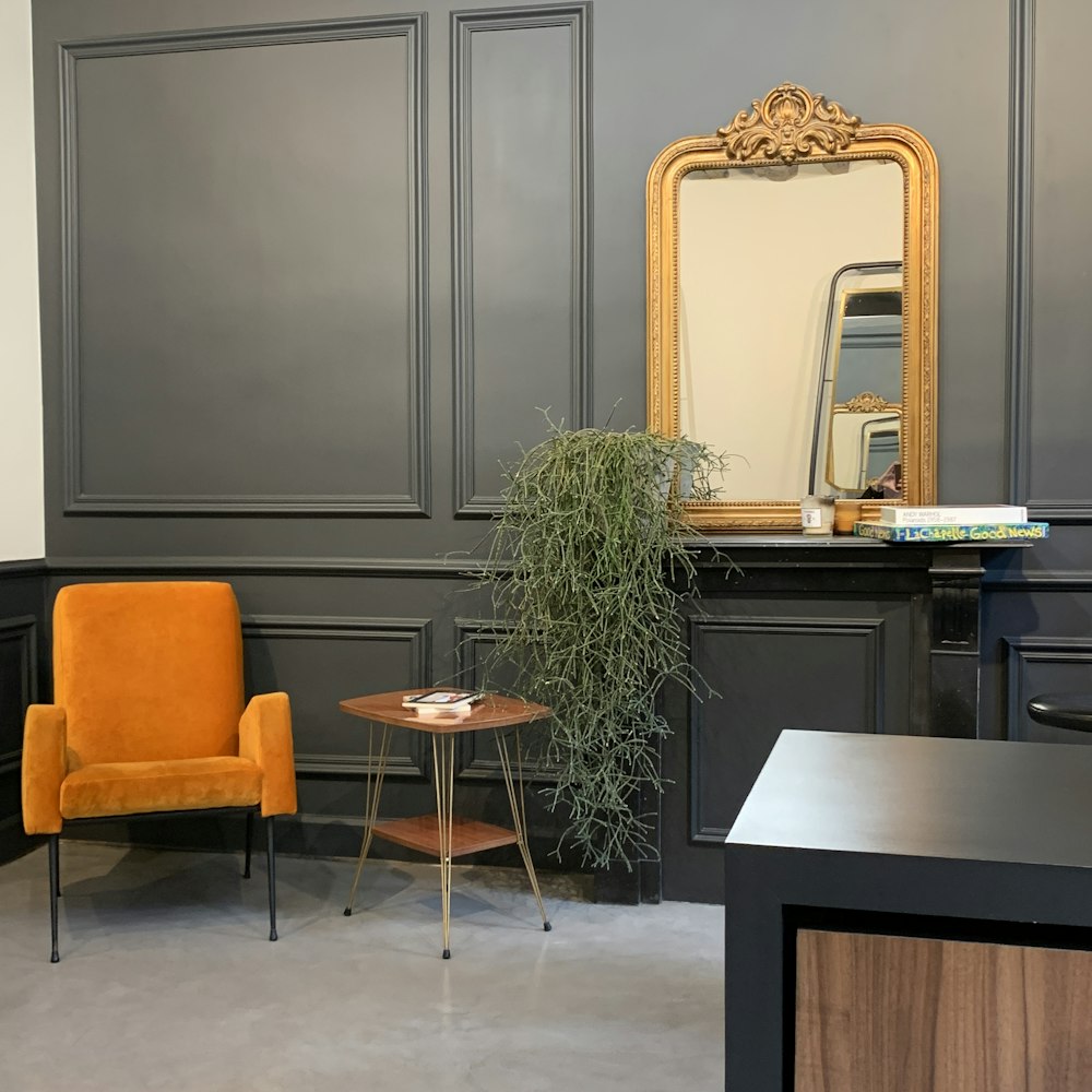 brown wooden chair beside black wooden table