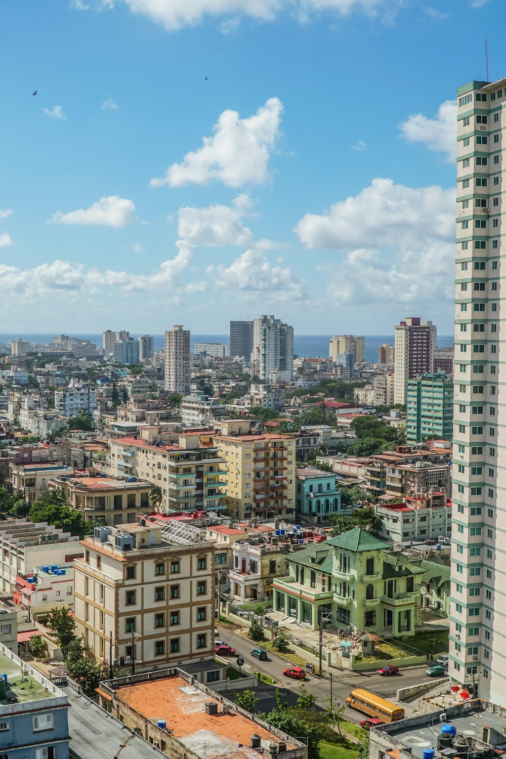 city buildings under blue sky during daytime