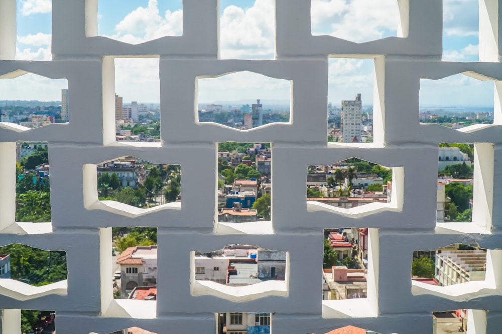 white concrete building with glass windows