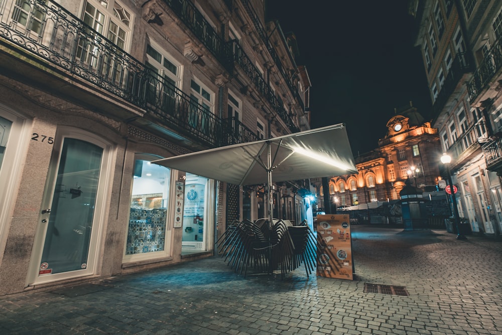 people walking on street during night time