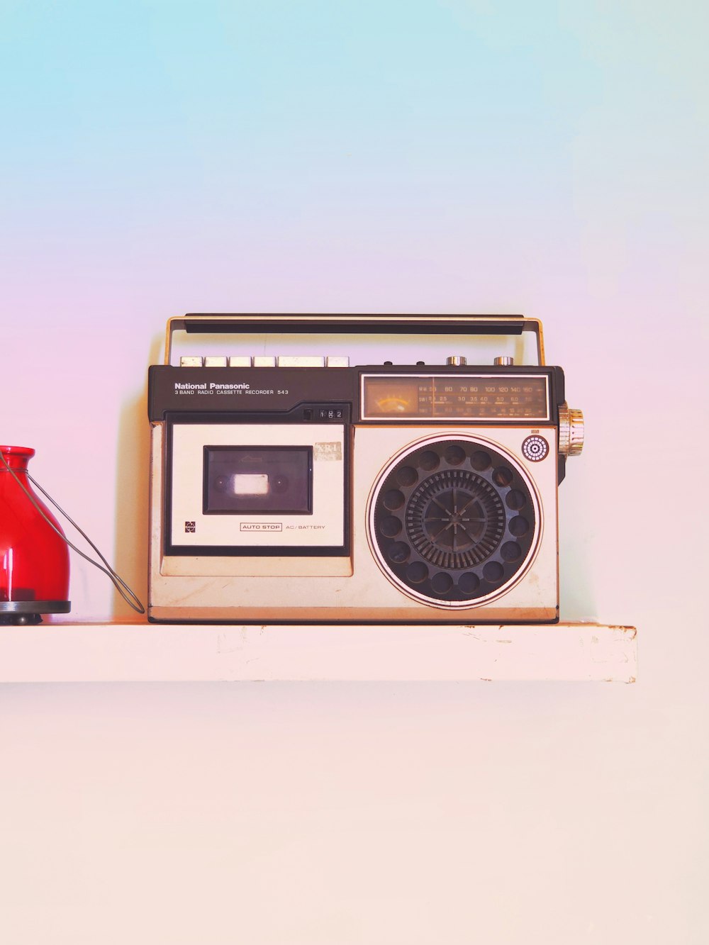 brown and black radio on white table