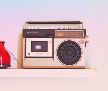 brown and black radio on white table