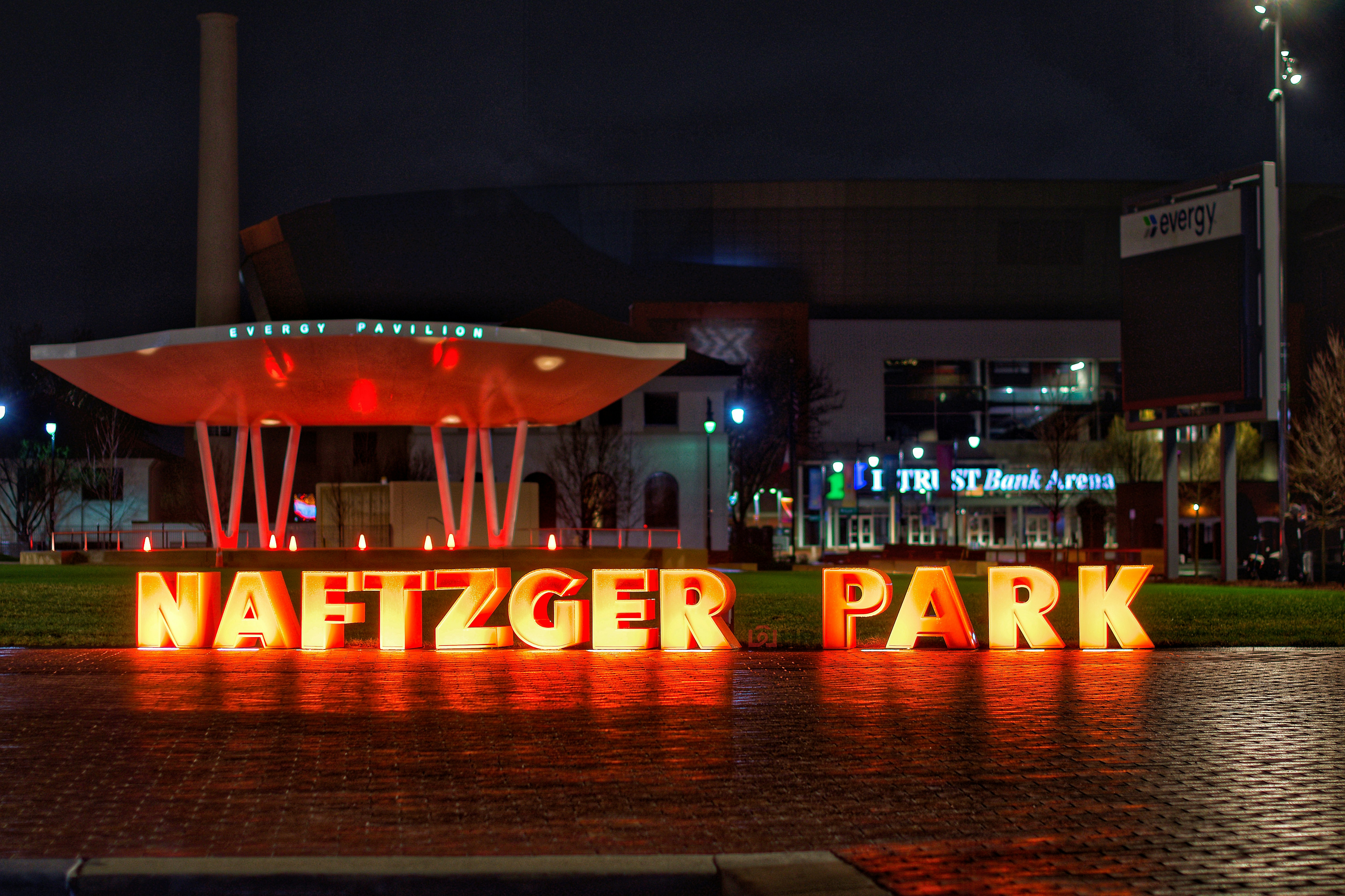 orange and black UNK lighted signage