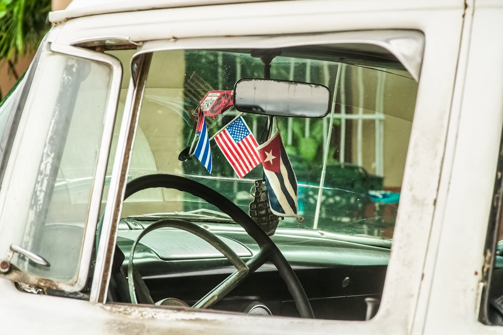 us a flag on car window