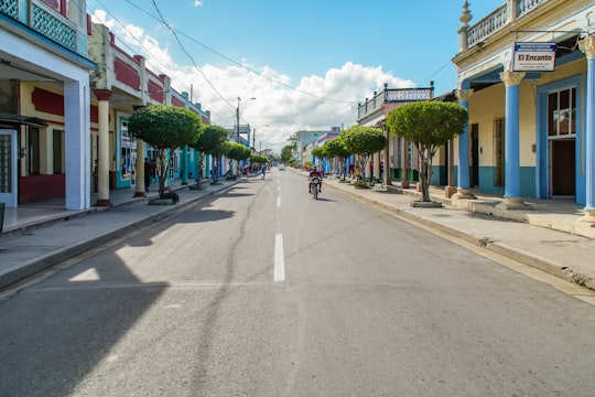 people walking on street during daytime in Las Tunas Cuba