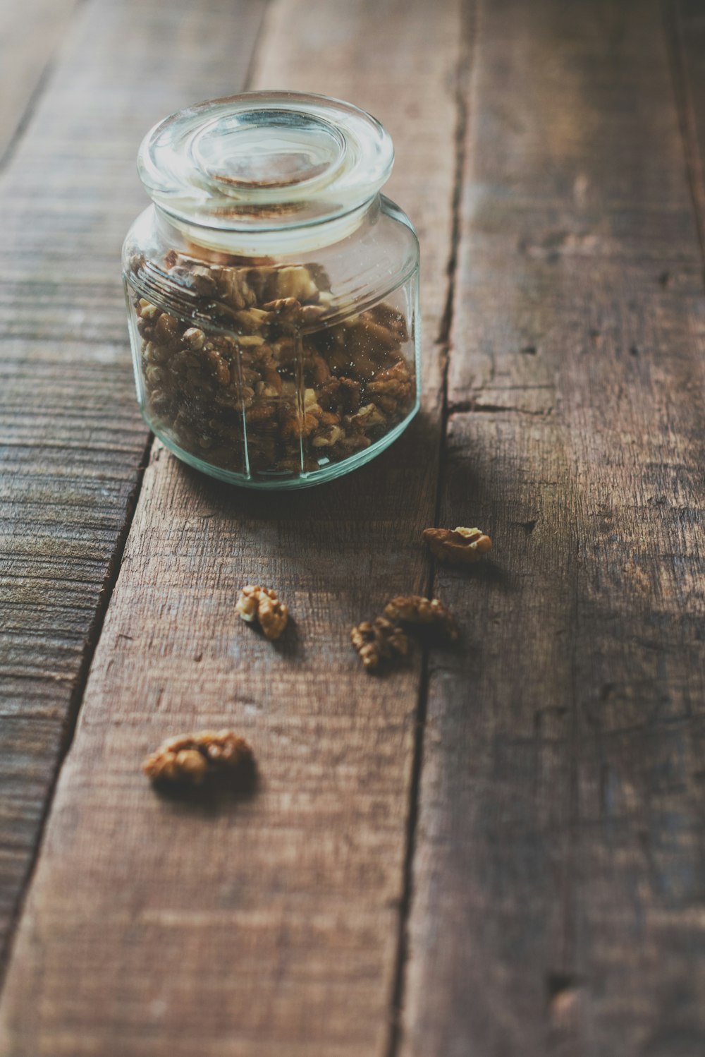 clear glass jar with brown coffee beans