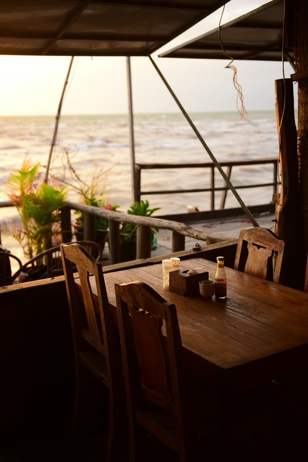 brown wooden table with chairs