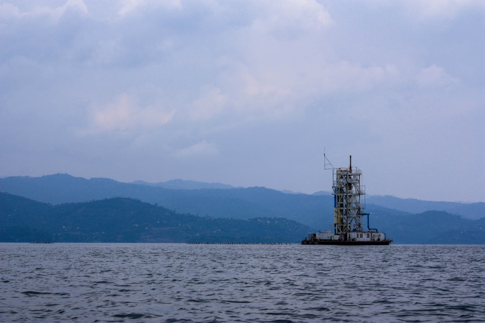 a large boat floating on top of a large body of water