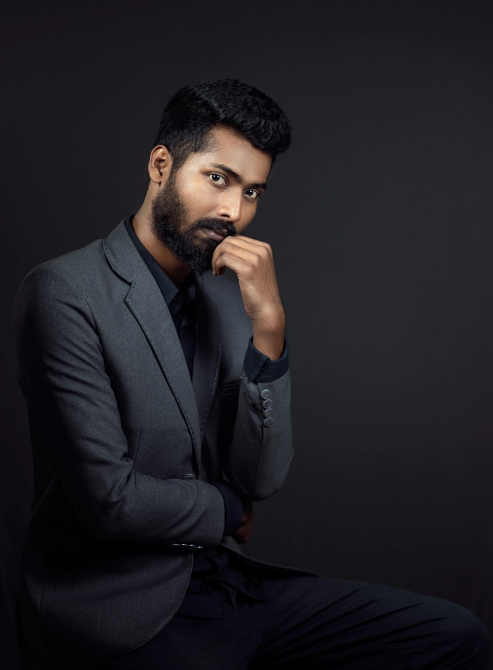 man in black suit jacket