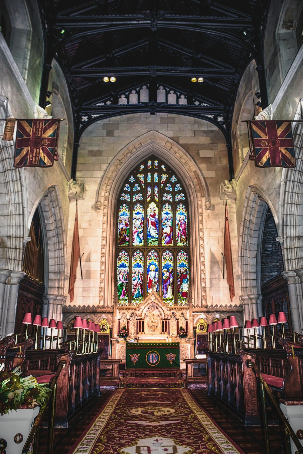 brown wooden chairs inside cathedral