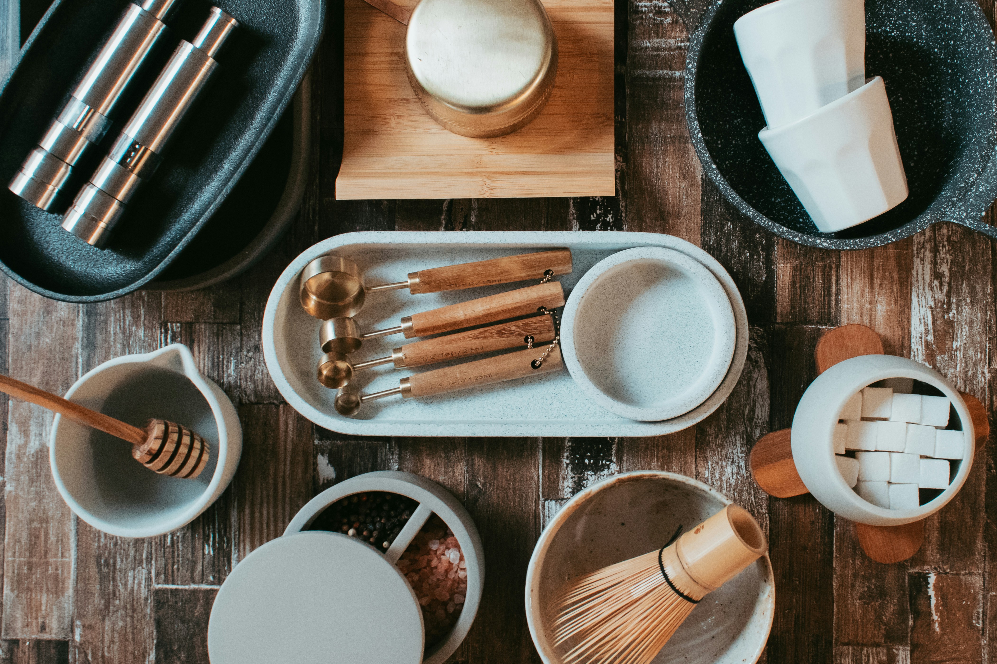 white ceramic round plate on brown wooden chopping board