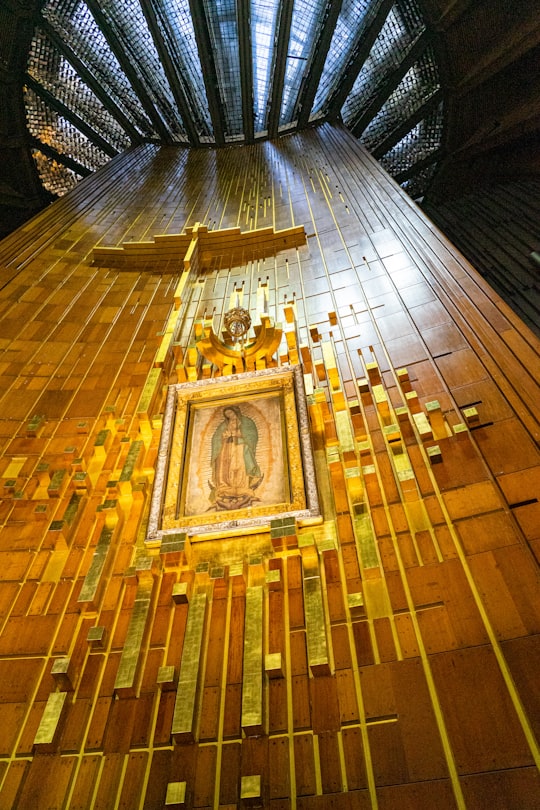 gold and white concrete building in Basilica of Our Lady of Guadalupe Mexico