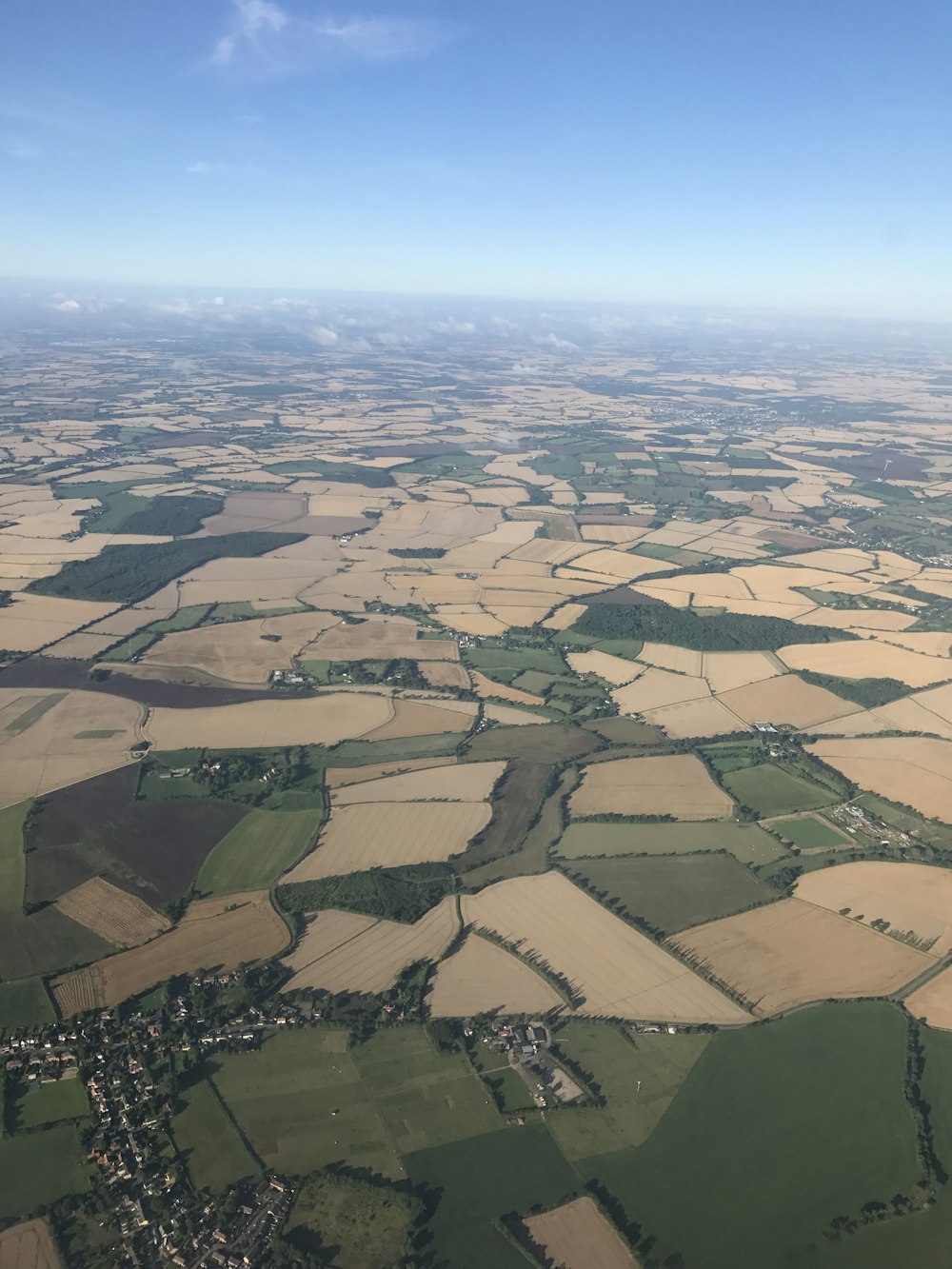 aerial view of green and brown field during daytime