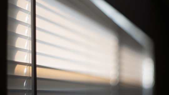 A serene meditation session with soft natural light filtering through a window.