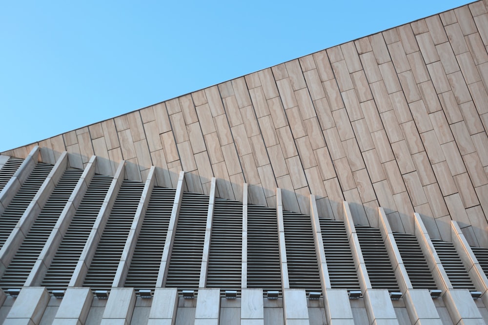 brown concrete building under blue sky during daytime