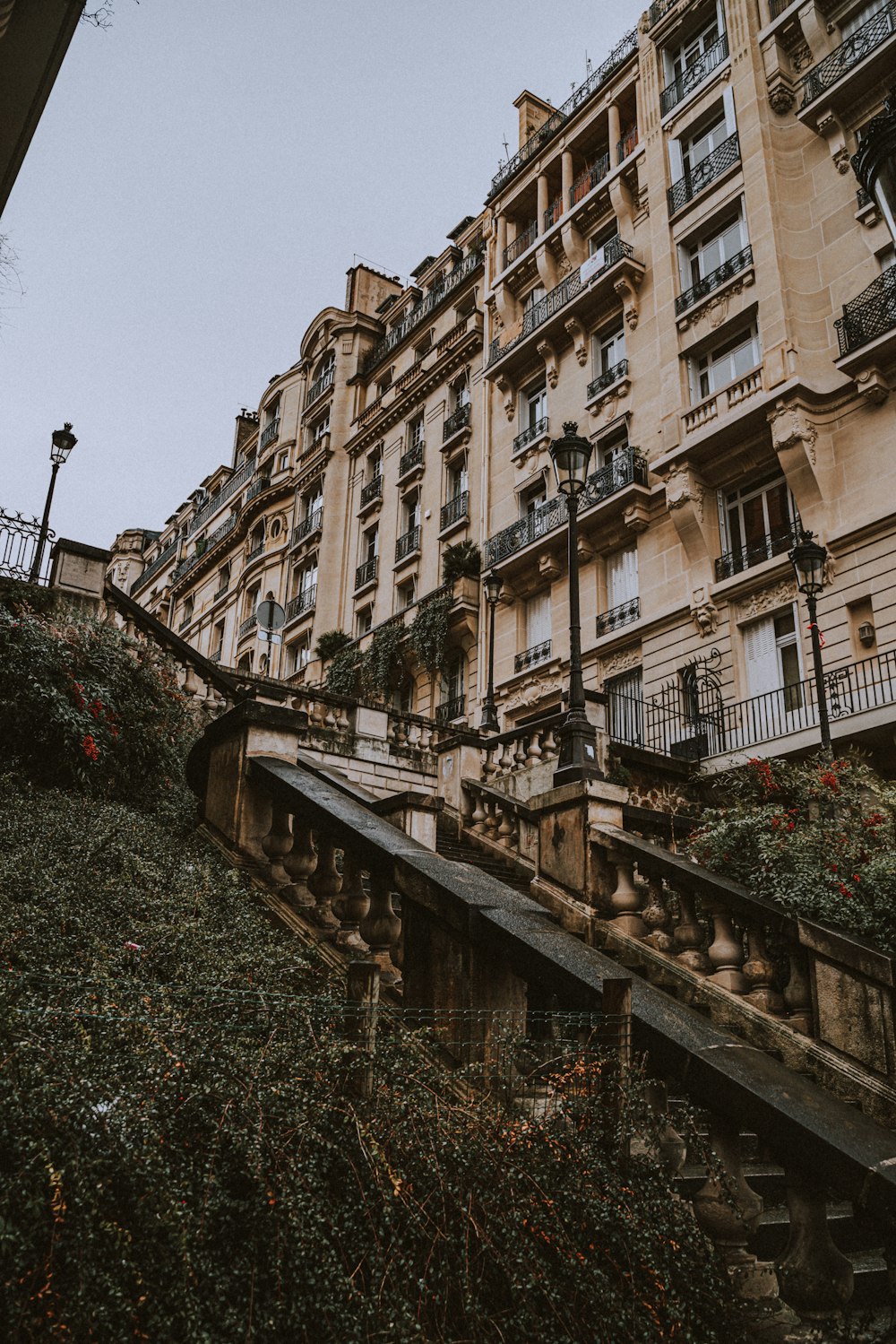 a very tall building with lots of windows and balconies