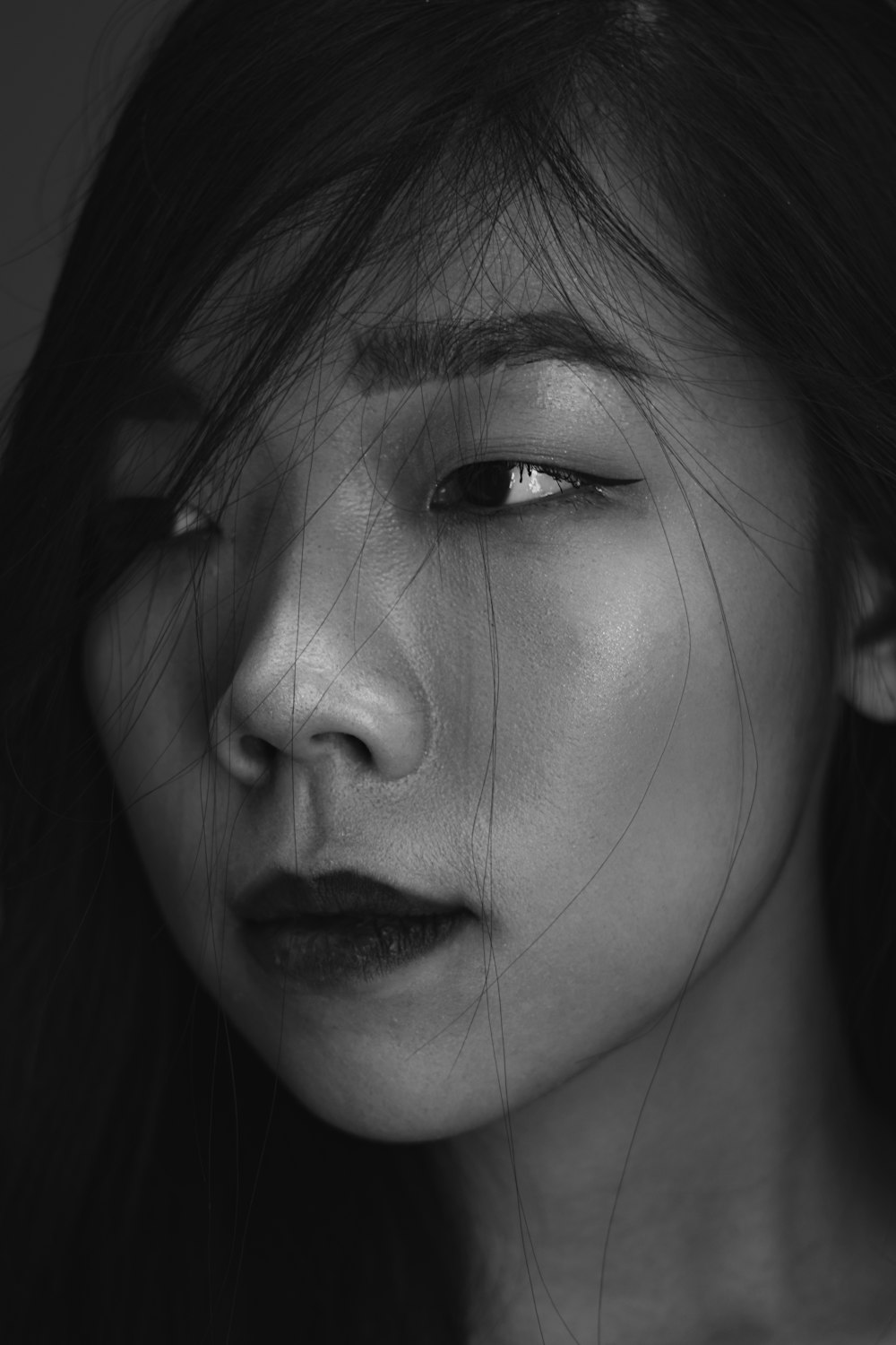 grayscale photo of girls face