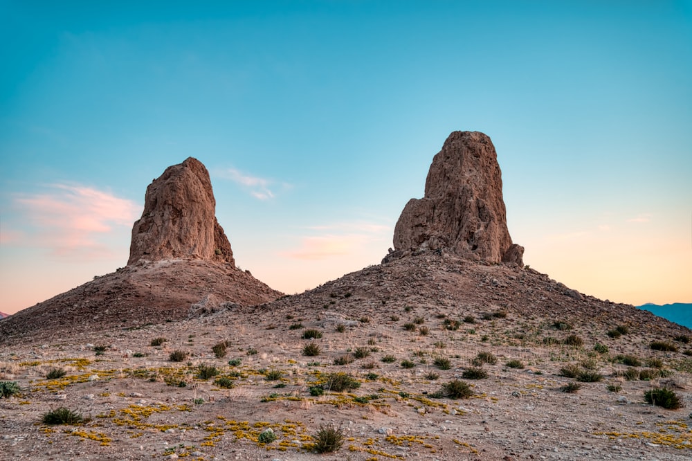 brown rock formation under blue sky during daytime