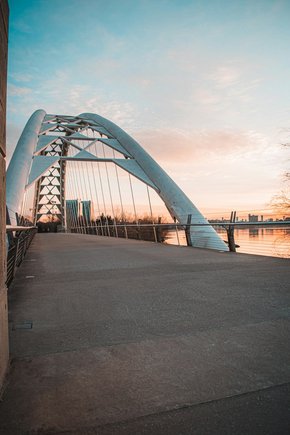 gray concrete bridge under gray sky