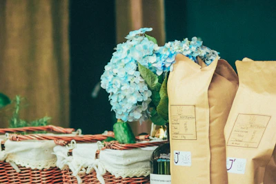 An elegant gift basket filled with personalized keepsakes and flowers.