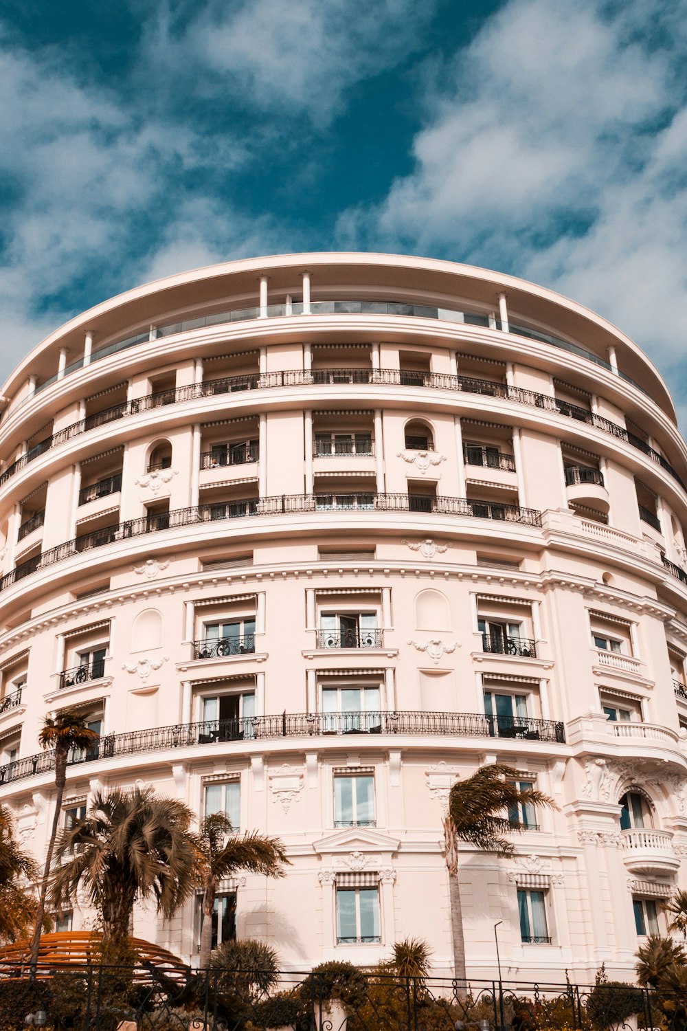 white concrete building under blue sky during daytime