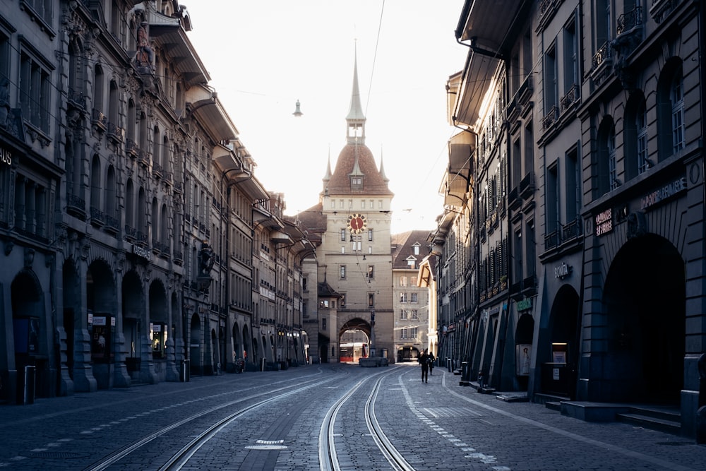 brown concrete building beside road during daytime