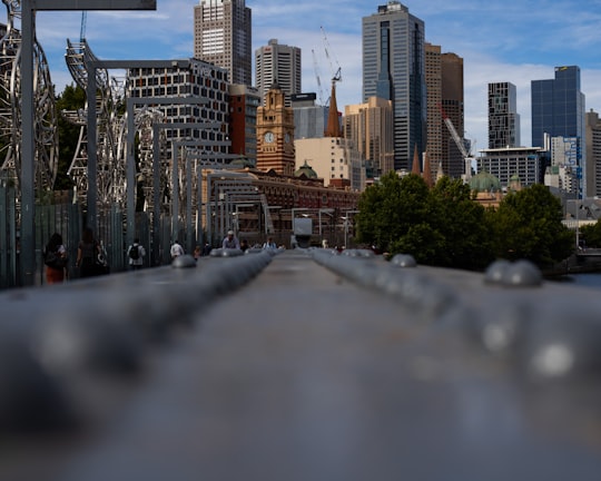 city buildings under white sky during daytime in Melbourne City Centre Australia