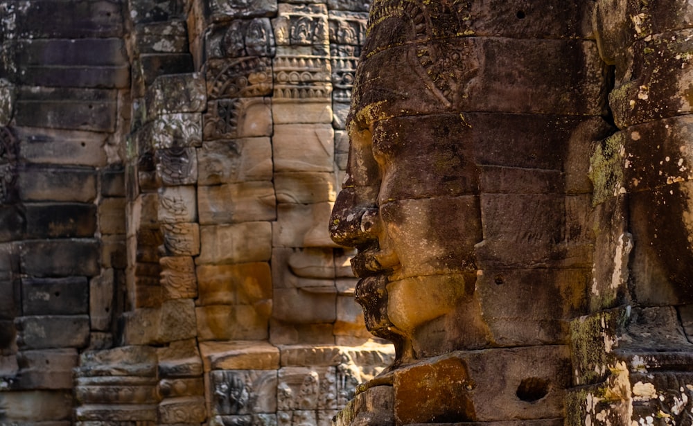 brown concrete statues during daytime