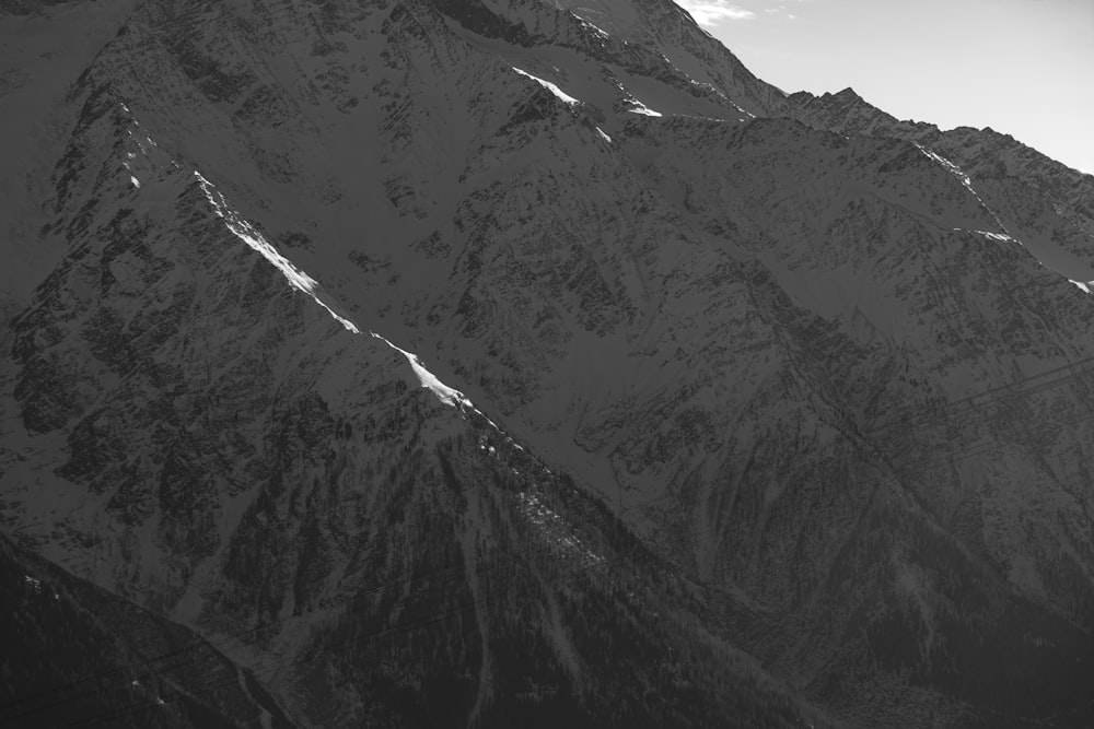 grayscale photo of mountain range