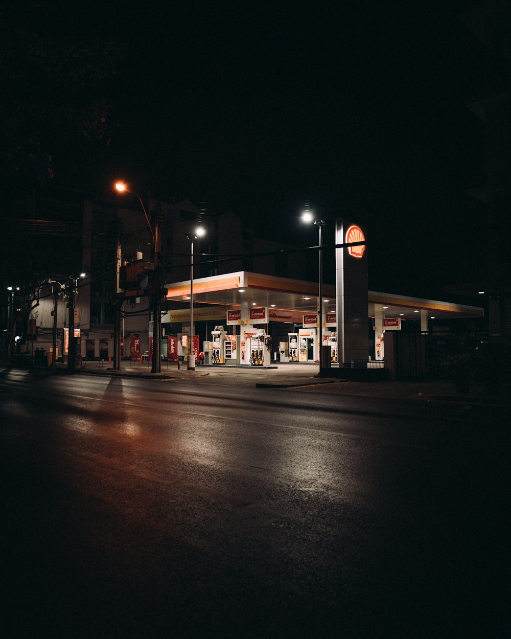 black car on road during night time