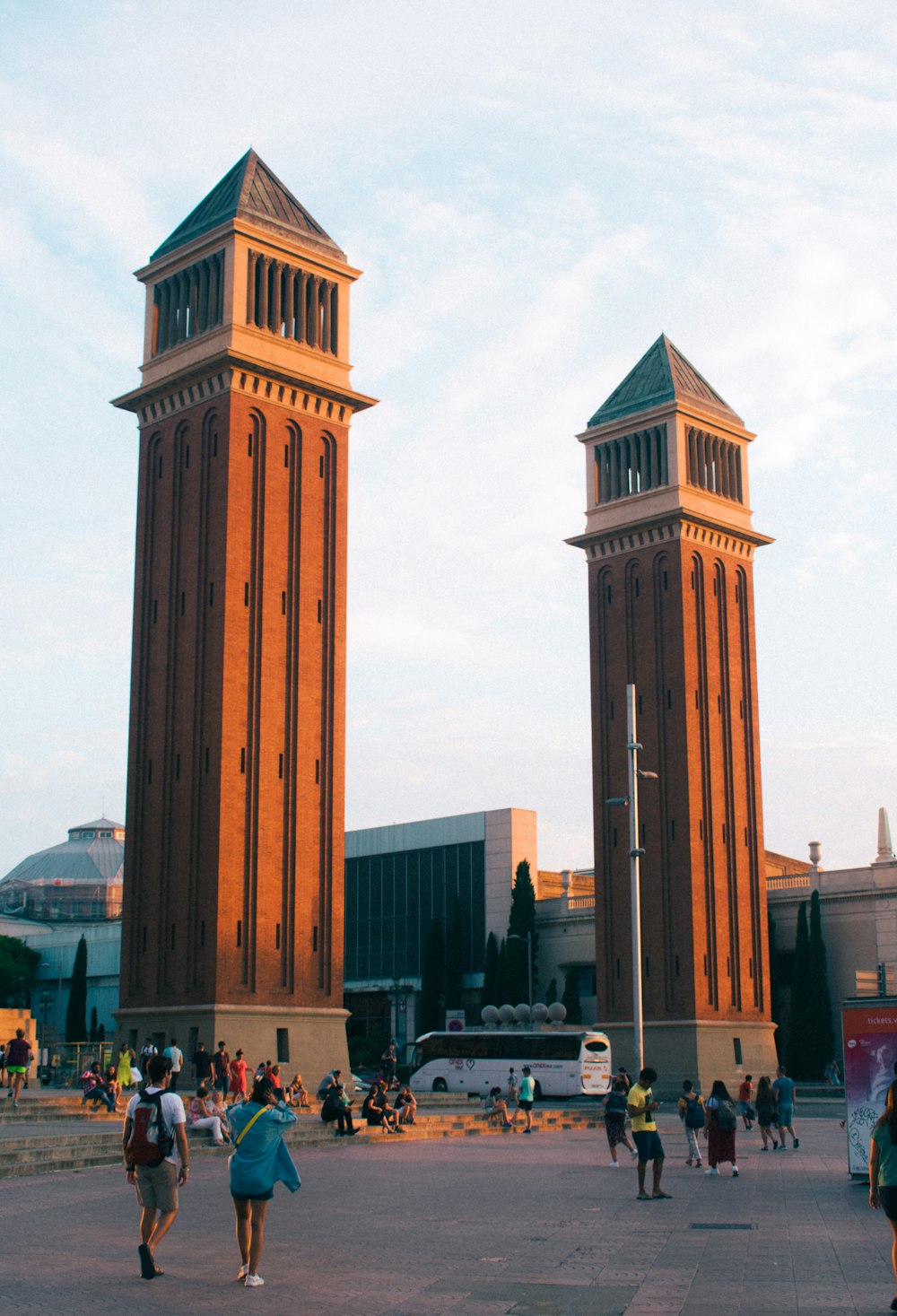 people walking near brown concrete building during daytime