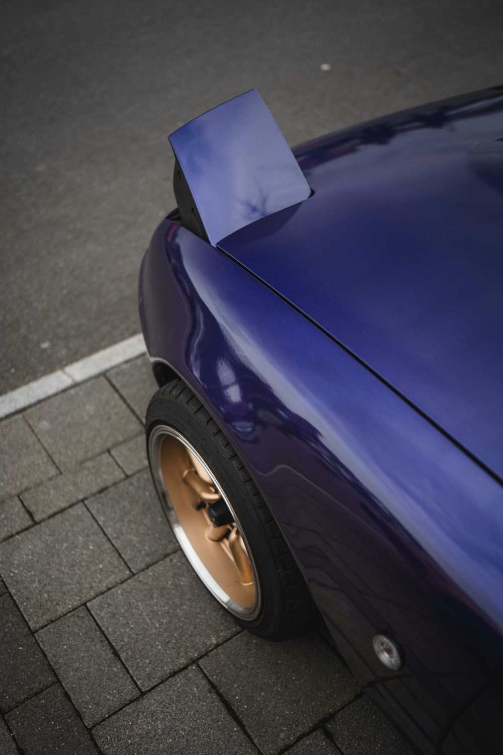 purple car on gray concrete road