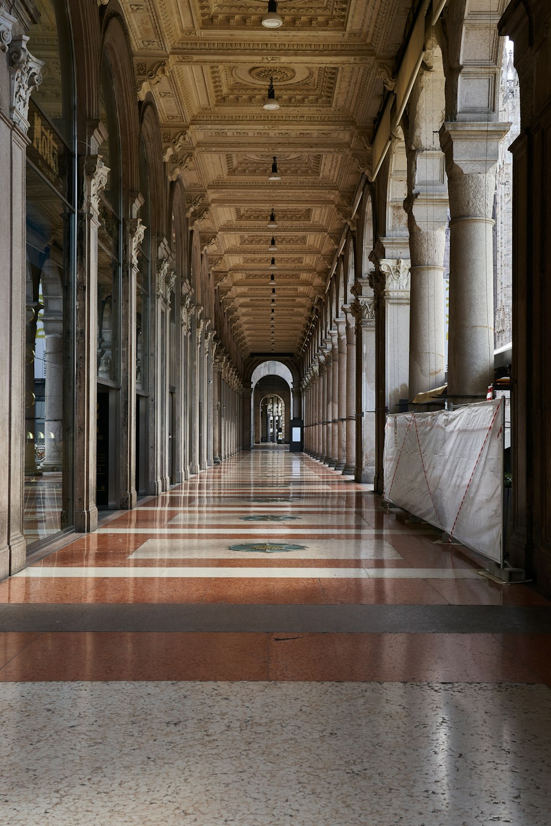 brown and white hallway with no people