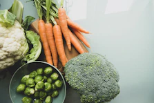 carrots and broccoli on stainless steel bowl