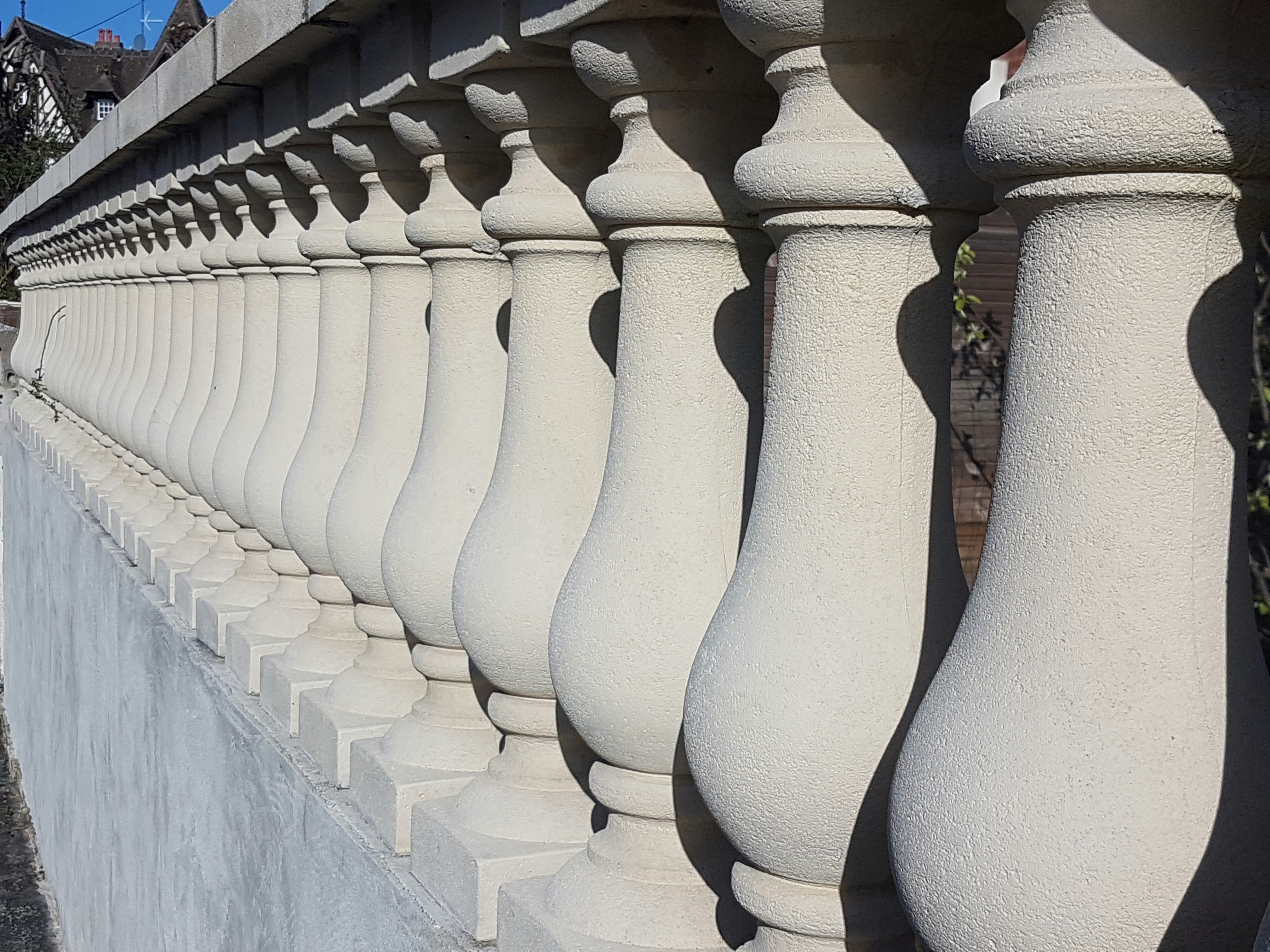 Decorative baluster tops on a balustrade