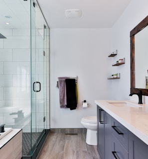 white ceramic sink near white ceramic sink