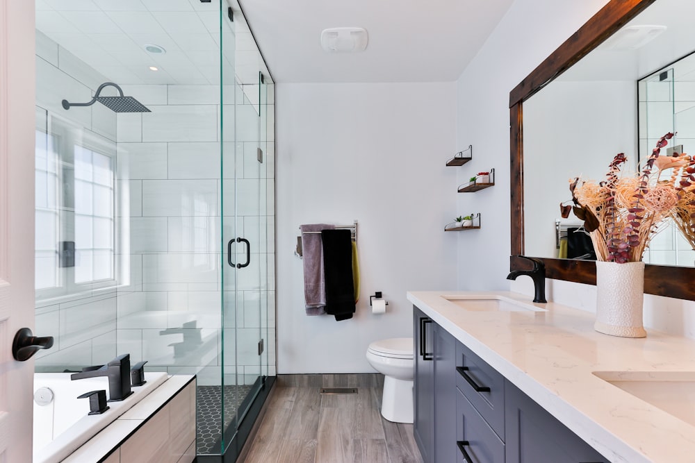 white ceramic sink near white ceramic sink