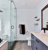 white ceramic sink near white ceramic sink