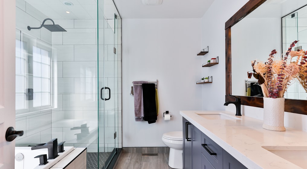 white ceramic sink near white ceramic sink