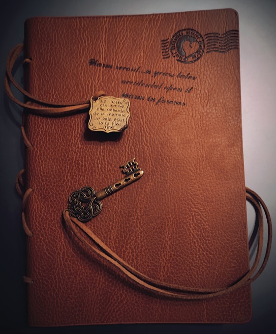 Elegant leather notebook with a custom laser-engraved monogram on the cover