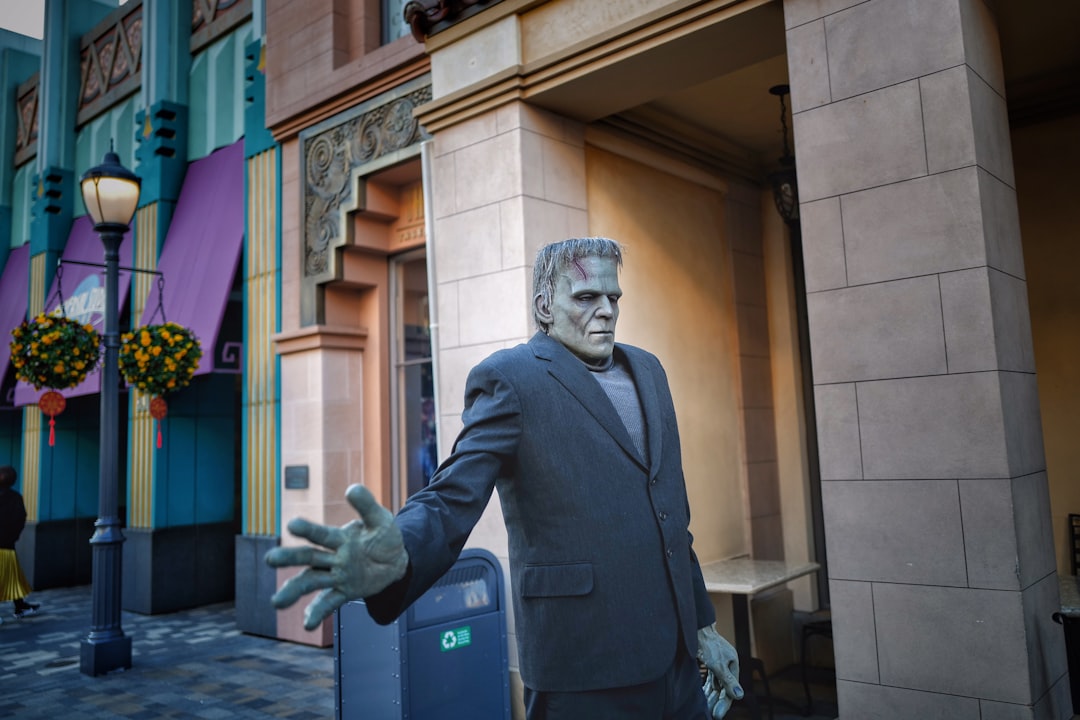 man in black suit statue