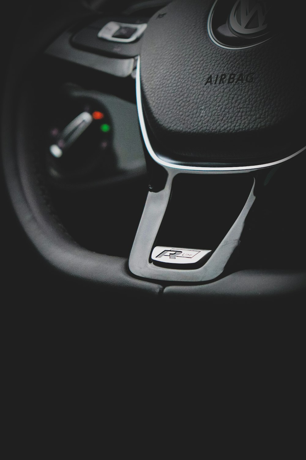 black and silver steering wheel