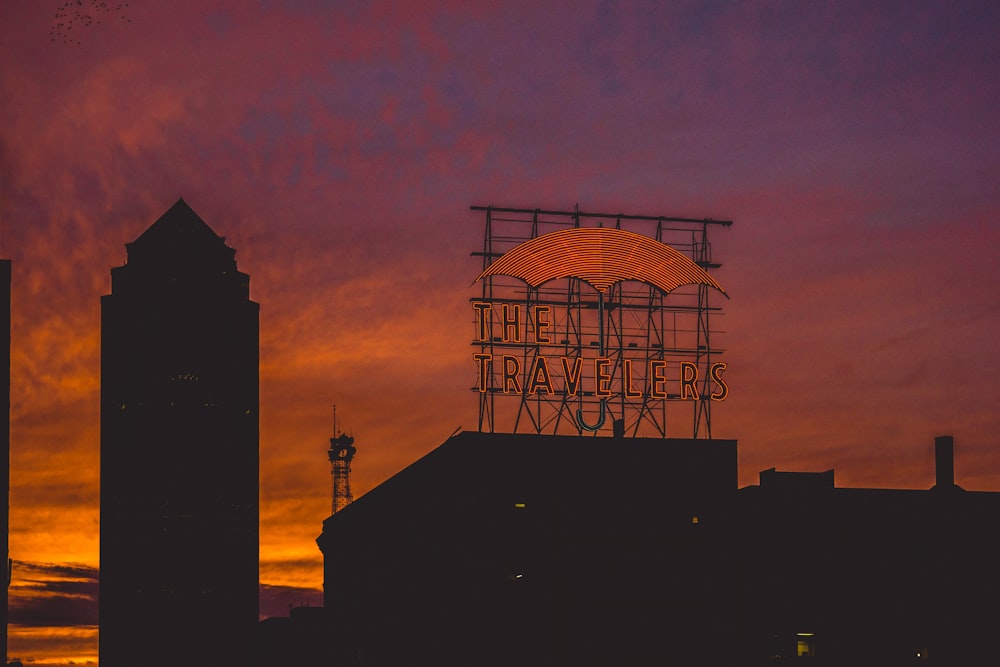 silhouette of building during sunset