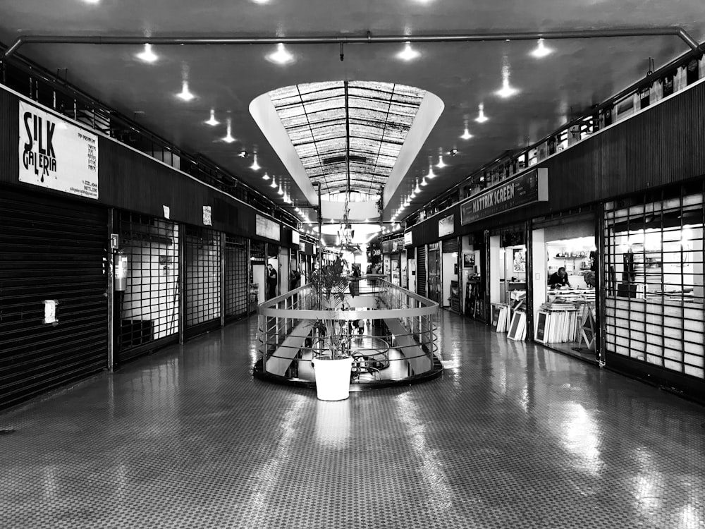 grayscale photo of a hallway