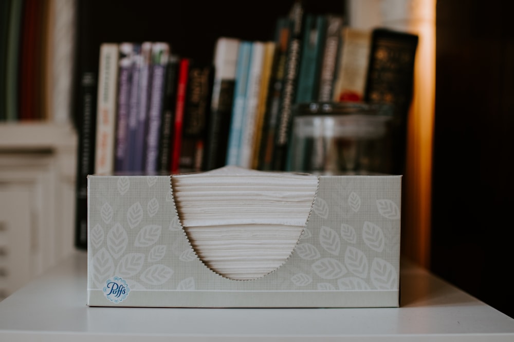 white and blue floral paper bag