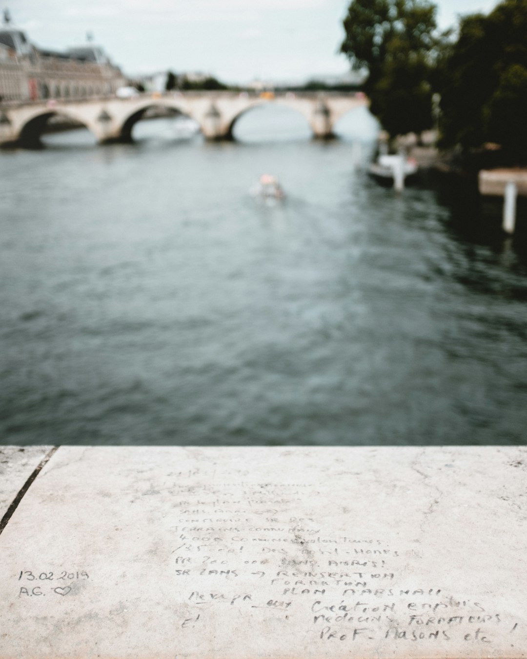 body of water near bridge during daytime